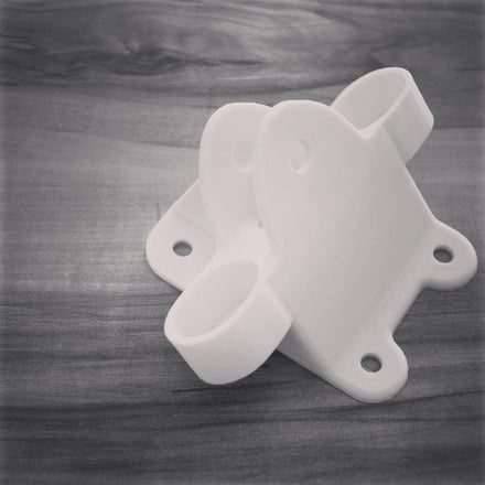 FDM is an excellent solution to low cost, rapid prototyping like this Connector Support Prototype for product testing purposes. This part was printed with white PLA. 